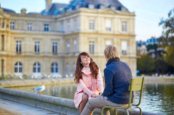 Young dating couple in the Luxembourg garden - Photo, Image