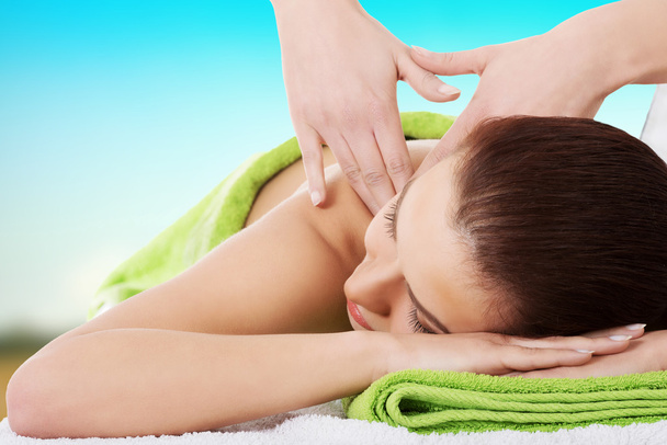 Woman getting massage in spa. - Fotografie, Obrázek