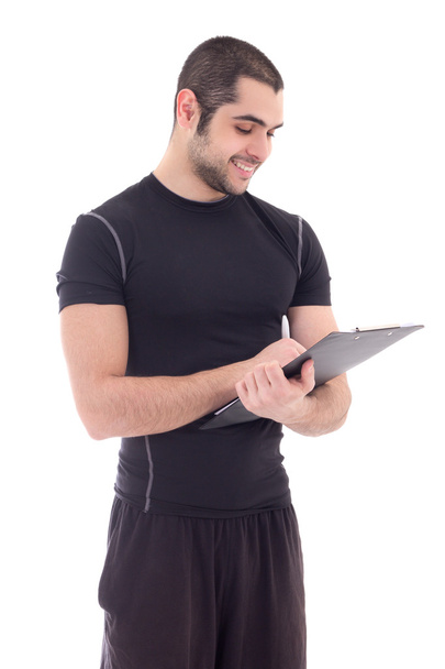 portret przystojny fitness trener w odzieży sportowej z clipboar - Zdjęcie, obraz