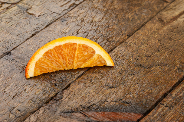 Slice of fresh orange - Фото, изображение