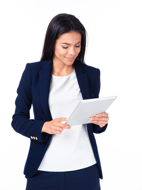 Happy businesswoman using tablet computer - Foto, Imagen