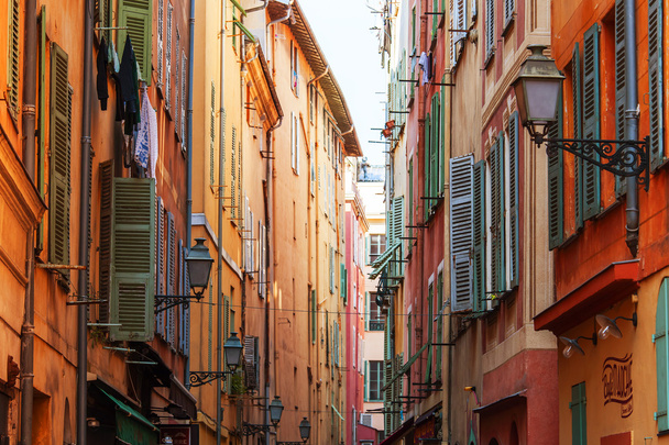 Nice, France, on March 11, 2015. The narrow street in the old city - Zdjęcie, obraz