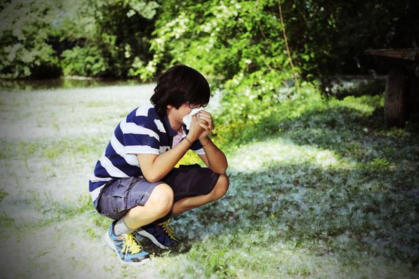 boy with pollen allergy with white handkerchief - Photo, Image