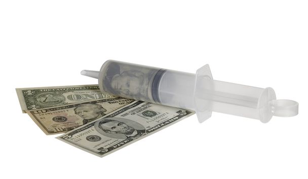 Plastic syringe and dollar banknotes - Photo, image