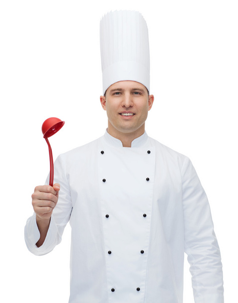 happy male chef cook holding ladle - Fotó, kép
