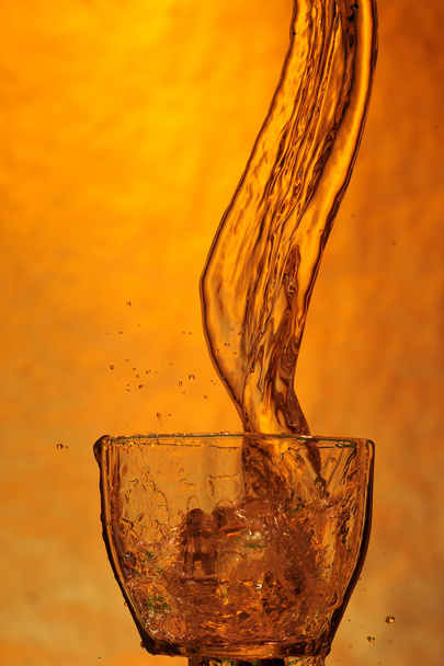 Splashing whisky - Foto, afbeelding