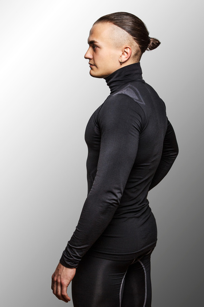 Male in black sportswear - 写真・画像