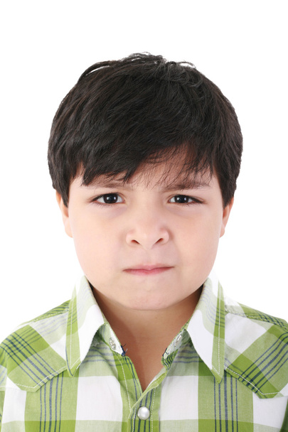 Portrait of beautiful little boy with serious look isolated on w - Photo, Image