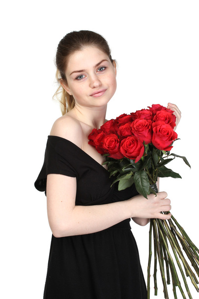Красива брюнетка з букетом троянд
 - Фото, зображення