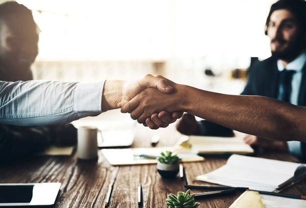Business people, teamwork and handshake in meeting, greeting and feedback for project, agreement and cooperation. Closeup, hello or group with promotion, opportunity and win for b2b deal or thank you. - Photo, Image