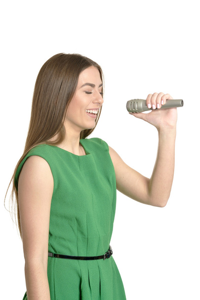 Young woman with microphone - Fotoğraf, Görsel