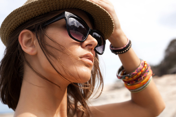 young summer girl wearing a hat  and sunglasses - Photo, Image