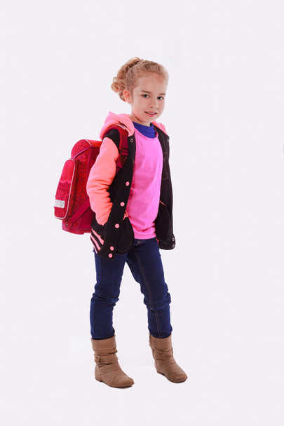 Les filles, habillées à la mode avec un sac d'école sur le dos
. - Photo, image