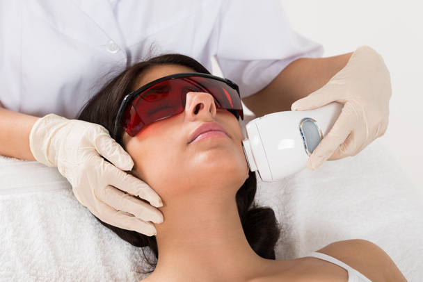 Beautician Giving Epilation Laser Treatment - Фото, изображение