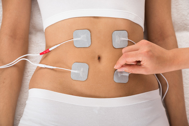 Therapist Placing Electrodes - Foto, Imagem