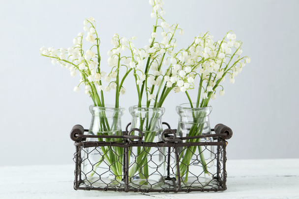 Lily of the Valley in bottles - Foto, Imagen