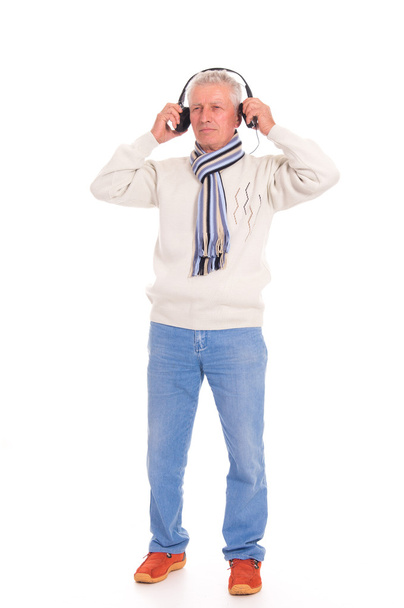 Old man with headphones - Foto, imagen