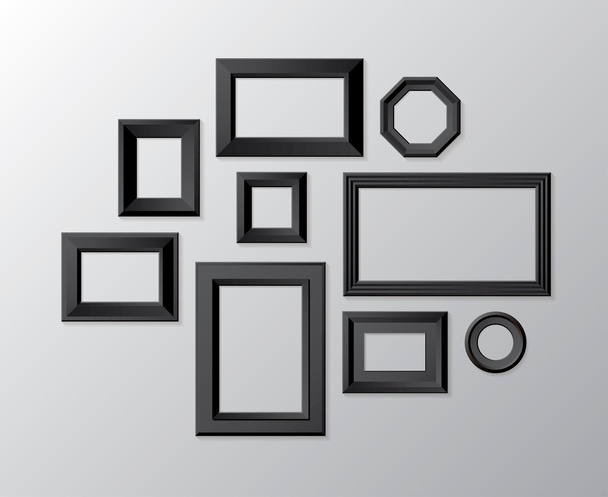 Vector set van zwarte fotolijsten op de witte muur - Vector, afbeelding