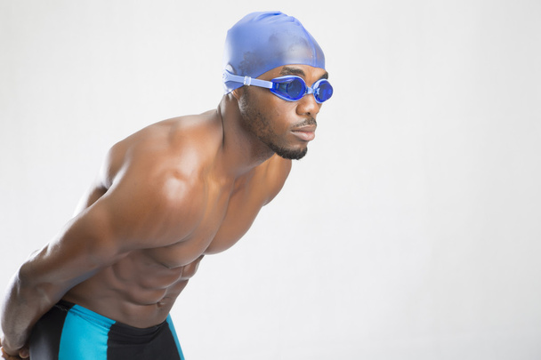 水泳帽と眼鏡の若い男 - 写真・画像