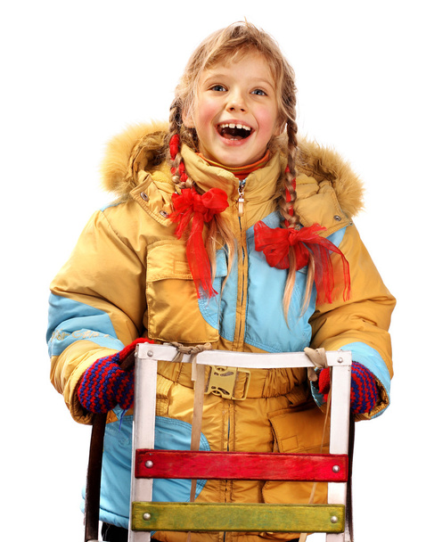 Child holding sleigh on white. - Φωτογραφία, εικόνα
