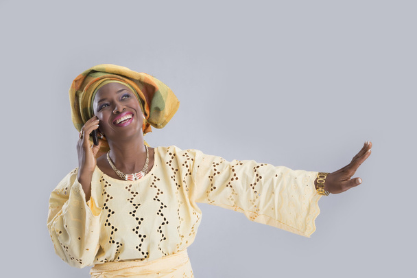 Woman speaking phone and smiling isolated - Photo, Image
