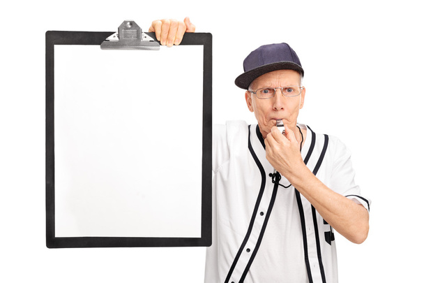 Elderly baseball coach holding a clipboard - Photo, image