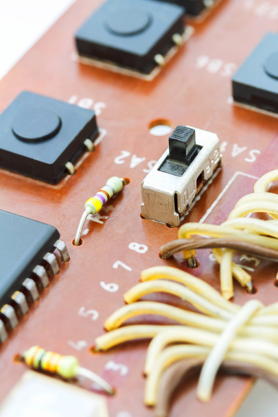 Electronic components on a obsolete printed-circuit board - Photo, Image