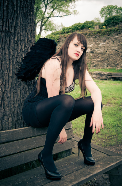 Fekete angyal szárnya nő - Fotó, kép