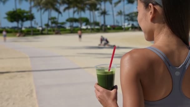 Woman drinking vegetable smoothi - Filmmaterial, Video