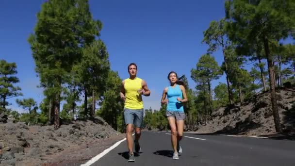 Couple Running on Road - Footage, Video