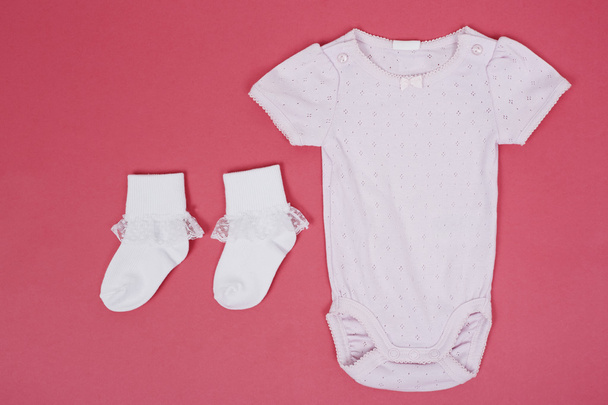 Pink babygro and socks - Фото, изображение