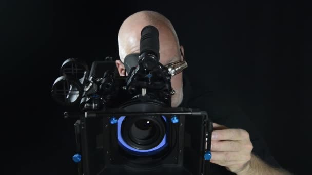 Cameraman with a professional movie camera - Footage, Video