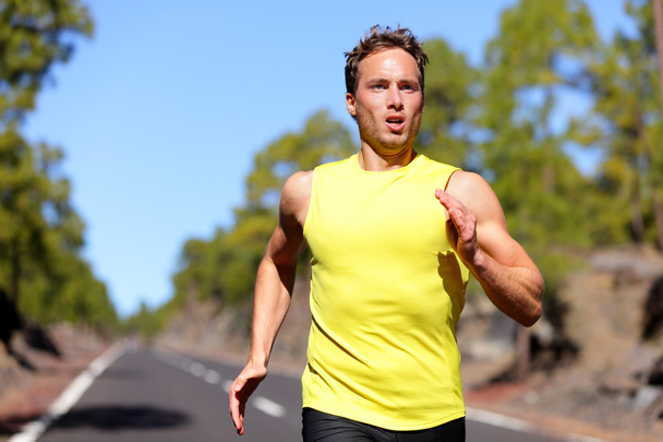 Male athlete runner training at fast speed - Foto, Imagem