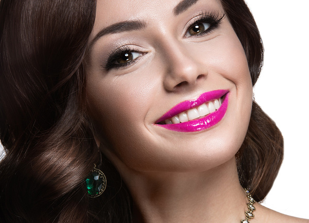 Beautiful woman with evening make-up, pink lips and curls. Beauty face. - Valokuva, kuva