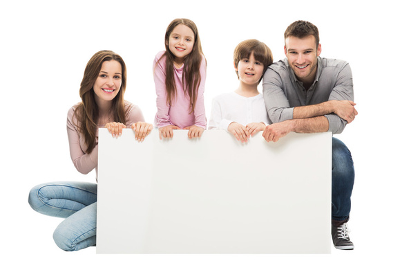 Famiglia felice con striscione
 - Foto, immagini