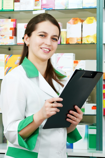 Pharmacy chemist woman in drugstore - Valokuva, kuva