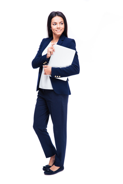 Full length portrait of a businesswoman with laptop - 写真・画像