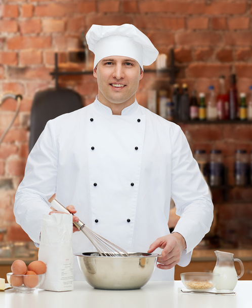 happy male chef cook baking - Foto, immagini