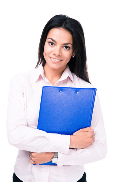 Smiling businesswoman standing with folder - Foto, Imagen
