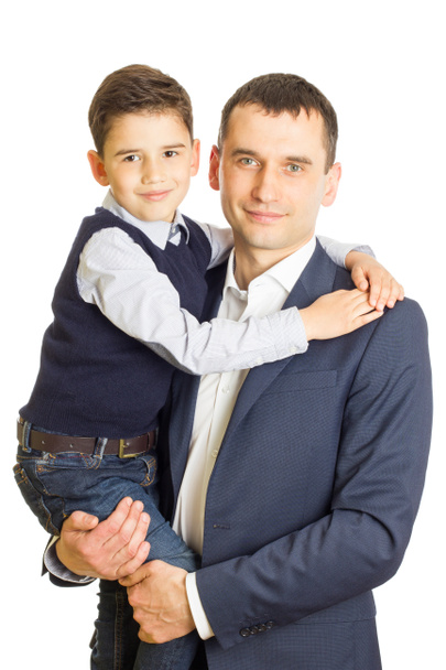 Pai e filho estão abraçando
 - Foto, Imagem