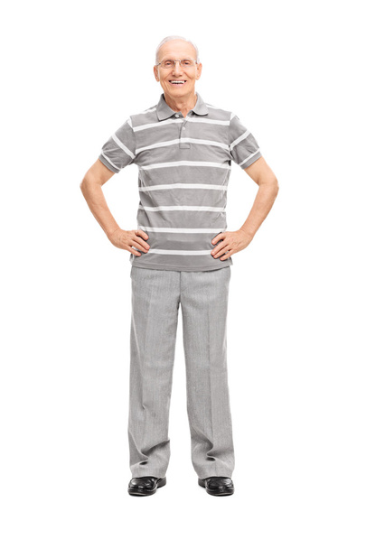 Senior man in gray pants and polo - Foto, imagen