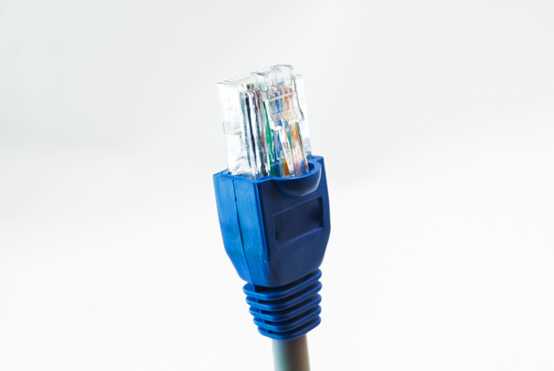 Hálózati kábel Rj45 fej fehér háttér - Fotó, kép