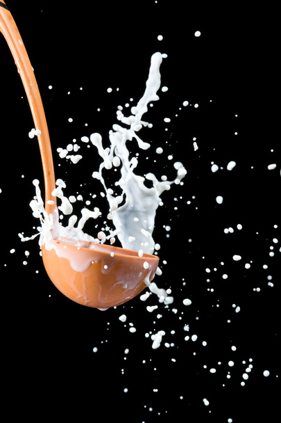 Scoop and milk - Foto, afbeelding