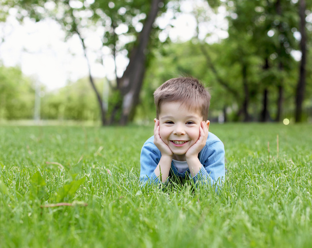 Portrait of a little boy outdoors - 写真・画像