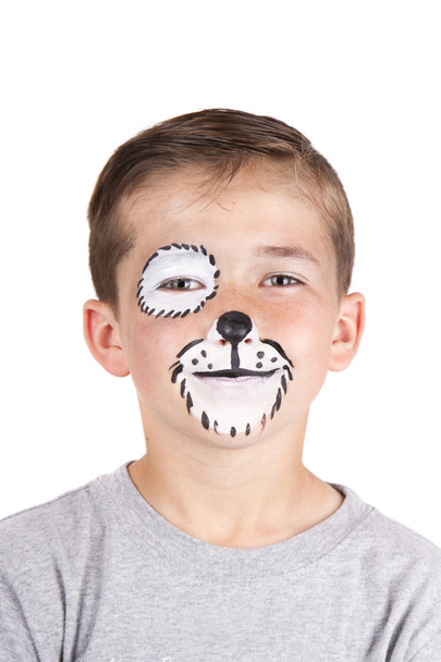 Young boy wearing dog carnival face paint - Fotoğraf, Görsel