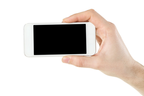 Hand holding mobile smart phone isolated on white - Photo, Image