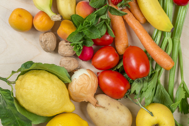 summer season fruit and vegetables on wooden table - Фото, зображення