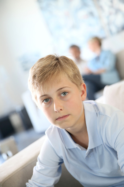 Boy sitting on couch - Photo, image