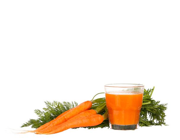Carrot juice and slices of carrot isolated on white - Photo, Image