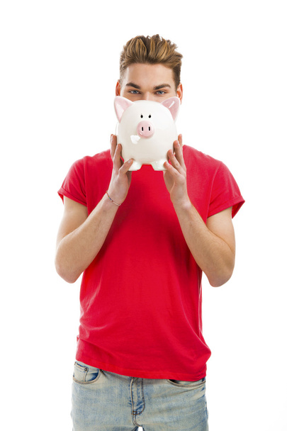 man holding a piggy bank - Zdjęcie, obraz